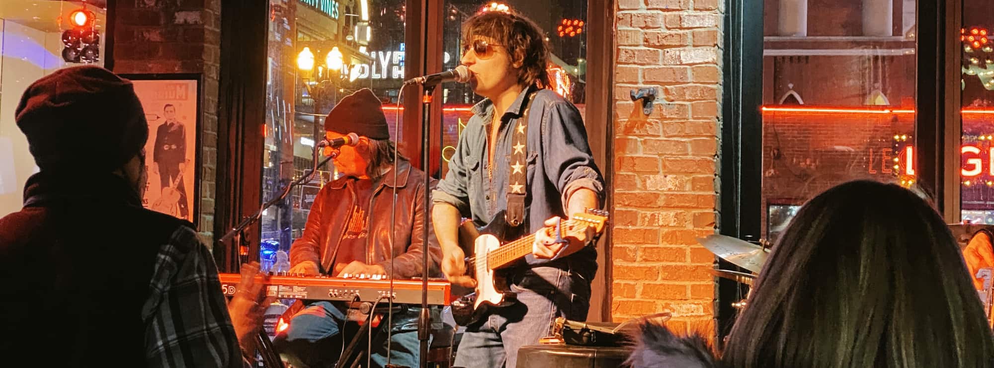bar singer on guitar in St Louis