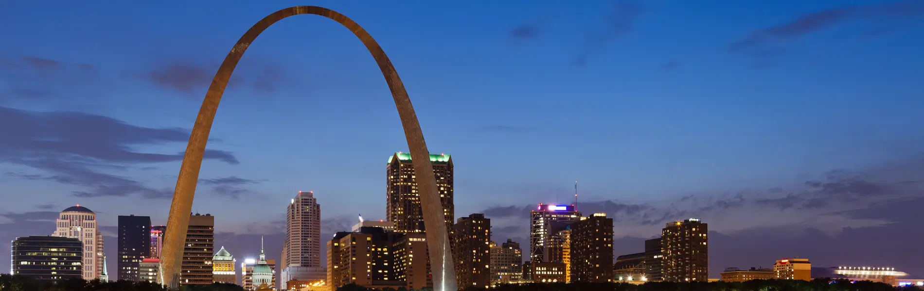 Neon color image of a band playing and people singing along